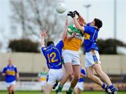 27 April 2008; Niall McNamee, Offaly, in action against Laurence Coskeran, 12, and Ciaran McDonald, Tipperary. Allianz National Football League, Division 4 Final, Tipperary v Offaly, O'Moore Park, Portlaoise, Co. Laois. Picture credit: Matt Browne / SPORTSFILE *** Local Caption ***
