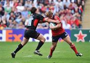 27 April 2008; Jerry Flannery, Munster, is tackled by Adam Powell, Saracens. Heineken Cup Semi-Final, Saracens v Munster, Ricoh Arena, Coventry, England. Picture credit: Brendan Moran / SPORTSFILE *** Local Caption ***