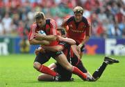 27 April 2008; Tomas O'Leary, Munster, is tackled by Adam Powell, left, and Kevin Sorrell, Saracens. Heineken Cup Semi-Final, Saracens v Munster, Ricoh Arena, Coventry, England. Picture credit: Stephen McCarthy / SPORTSFILE *** Local Caption ***