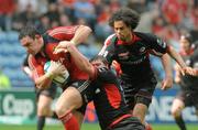 27 April 2008; David Wallace, Munster, is tackled by Neil De Kock, left, and Richard Haughton, Saracens. Heineken Cup Semi-Final, Saracens v Munster, Ricoh Arena, Coventry, England. Picture credit: Stephen McCarthy / SPORTSFILE *** Local Caption ***