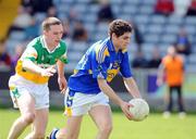 27 April 2008; Philip Austin, Tipperary, in action against Ger Rafferty, Offaly. Allianz National Football League, Division 4 Final, Tipperary v Offaly, O'Moore Park, Portlaoise, Co. Laois. Picture credit: Matt Browne / SPORTSFILE *** Local Caption ***