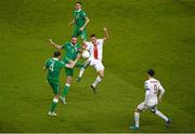 29 March 2015; Poland's Slawamir Peszko and Robert Lewandowski, right, in action against Republic of Ireland's Robbie Brady, top, Marc Wilson, middle, and John O'Shea. UEFA EURO 2016 Championship Qualifier, Group D, Republic of Ireland v Poland. Aviva Stadium, Lansdowne Road, Dublin. Picture credit: Ray McManus / SPORTSFILE
