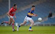 9 April 2015; Kevin O'Halloran, Tipperary, in action against Darragh Murphy, Cork. EirGrid Munster U21 Football Championship Final, Tipperary v Cork. Semple Stadium, Thurles, Co. Tipperary. Picture credit: Stephen McCarthy / SPORTSFILE
