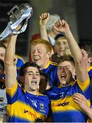 9 April 2015; Colin O'Riordan, Tipperary captain, and teammate Steven O'Brien raise the trophy. EirGrid Munster U21 Football Championship Final, Tipperary v Cork, Semple Stadium, Thurles, Co. Tipperary. Picture credit: Cody Glenn / SPORTSFILE