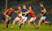 9 April 2015; Josh Keane, Tipperary, in action against Darragh Murphy, left, and Brian O'Driscoll, Cork. EirGrid Munster U21 Football Championship Final, Tipperary v Cork. Semple Stadium, Thurles, Co. Tipperary. Picture credit: Stephen McCarthy / SPORTSFILE