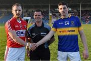 9 April 2015; Cork captain Brian O'Driscoll, left, shakes hands with Tipperary captain Colin O'Riordan before the match alongside referee Sean Joy. EirGrid Munster U21 Football Championship Final, Tipperary v Cork, Semple Stadium, Thurles, Co. Tipperary. Picture credit: Cody Glenn / SPORTSFILE