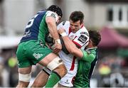 11 April 2015; Jared Payne, Ulster, is tackled by John Muldoon, left, and Robbie Henshaw, Connacht. Guinness PRO12, Round 19, Connacht v Ulster, Sportsground, Galway. Picture credit: Ramsey Cardy / SPORTSFILE