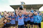11 April 2015; UCD captain Ciara Grant lifts the cup as her team-mates celebrate. WSCAI Intervarsities Cup Final, UCD v UCC, Waterford IT, Waterford. Picture credit: Matt Browne / SPORTSFILE