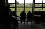 11 April 2015; Spectators look on from the clubhouse as the teams warm up before the game. Ulster Bank League, Division 1A, Young Munster v Lansdowne. Tom Clifford Park, Limerick. Picture credit: Diarmuid Greene / SPORTSFILE