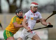 11 April 2015; Damien Casey, Tyrone, in action against Jamsie Donnelly, Donegal. Allianz Hurling League Division 2B Promotion / Relegation Play-off, Donegal v Tyrone, Owenbeg, Derry. Picture credit: Oliver McVeigh / SPORTSFILE