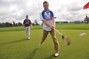 28 April 2008; Waterford hurler Dave Bennett show his skills to Galway hurler Greg Kennedy at the launch of theFBD GAA Golf Challenge. Carton House, Maynooth, Co. Kildare. Picture credit: David Maher / SPORTSFILE