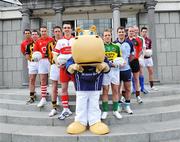 30 April 2008; Some of Ireland's most talented GAA stars gathered in Dublin to kick off Ulster Bank's sponsorship campaign for the 2008 GAA Football Championships. Led by mascot Henri Hippo, the 'UB Stars' team consists of an unrivalled selection of top footballers and hurlers, all working for various Ulster Bank branches across the country. At the launch is Henri Hippo, with from left, Cork's Sean Og O'hAilpin, Kilkenny's PJ Delaney, Cork's John Gardiner, Kilkenny's Michael Fennelly, Derry's Kevin McGuckian, Kerry's Darren O'Sullivan, Dublin's Bryan Cullen, Down's Kevin McGuigan, Longford's Damien Sheridan, and Galway's Finian Hanley. Ulster Bank Georges Quay, Dublin. Picture credit: Brian Lawless / SPORTSFILE