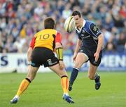 3 May 2008; Jonathan Sexton, Leinster, kicks ahead of Ceri Sweeney, Newport Gwent Dragons. Magners League, Leinster v Newport Gwent Dragons, RDS, Ballsbridge, Dublin. Picture credit; Stephen McCarthy / SPORTSFILE