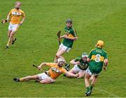 11 April 2015; Neil McManus, Antrim, supported by team mate Daniel McKernan, retains possession under pressure from Kerry players Daniel Collins, 7, Colm Harty, 12, and John Griffin. Allianz Hurling League Division 1B Promotion / Relegation Play-off, Antrim v Kerry, Parnell Park, Dublin. Picture credit: Ray McManus / SPORTSFILE