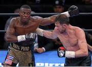 11 April 2015; Peter Quillin battles Andy Lee (black and red gloves) during their middleweight fight. Barclays Center, Brooklyn, New York, USA. Picture credit: Tim Hunger / SPORTSFILE World Boxing Organization