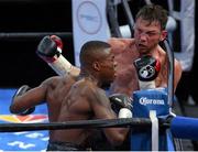 11 April 2015; Peter Quillin battles Andy Lee (black and red gloves) during their middleweight fight. Barclays Center, Brooklyn, New York, USA. Picture credit: Tim Hunger / SPORTSFILE World Boxing Organization