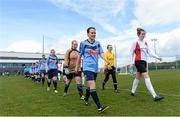 11 April 2015; Ciara Grant, UCD, captain and Laura Lynch, UCC captain lead out their teams. WSCAI Intervarsities Cup Final, UCD v UCC, Waterford IT, Waterford. Picture credit: Matt Browne / SPORTSFILE