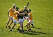 11 April 2015; John Griffin, supported by Daniel Collins, Kerry, in action against Antrim players Mathew Donnelly, 14, PJ O'Connell, 15, and Paul Shiels. Allianz Hurling League Division 1B Promotion / Relegation Play-off, Antrim v Kerry, Parnell Park, Dublin. Picture credit: Ray McManus / SPORTSFILE