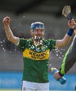 11 April 2015; John Egan celebrates at the end of the game as the Kerry kitman Jim Regan rushes in to greet him.  Allianz Hurling League Division 1B Promotion / Relegation Play-off, Antrim v Kerry, Parnell Park, Dublin. Picture credit: Ray McManus / SPORTSFILE
