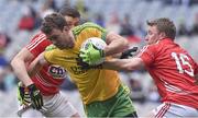 12 April 2015; Eamonn MaGee, Donegal, in action against Tomas Clancy, left, and Brian Hurley, Cork. Allianz Football League Division 1, Semi-Final, Cork v Donegal, Croke Park, Dublin. Picture credit: David Maher / SPORTSFILE
