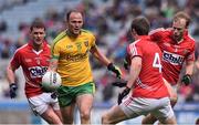 12 April 2015; Colm McFadden, Donegal, in action against Cork players, from left, Fintan Goold, James Loughrey and Michael Shields. Allianz Football League Division 1, Semi-Final, Cork v Donegal, Croke Park, Dublin. Picture credit: David Maher / SPORTSFILE