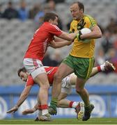 12 April 2015; Colm McFadden, Donegal, in action against Tomás Clancy, left, and Colm O'Driscoll, Cork. Allianz Football League Division 1, Semi-Final, Cork v Donegal. Croke Park, Dublin. Picture credit: Piaras Ó Mídheach / SPORTSFILE