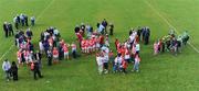 4 May 2008; Players, supporters and officials of both teams stand chatting long after the game. Suzuki Ladies National Football League, Division 1 Final, Cork v Kerry, Cusack Park, Ennis, Co. Clare. Picture credit: Ray McManus / SPORTSFILE