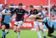 10 May 2008; Denis Hurley, Munster, is tackled by Dan Parks and Andrew Henderson, Glasgow Warriors. Magners League, Munster v Glasgow Warriors, Musgrave Park, Cork. Picture credit: Matt Browne / SPORTSFILE