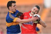 9 April 2015; Conor Horgan, Cork, in action against Luke Boland, Tipperary. EirGrid Munster U21 Football Championship Final, Tipperary v Cork, Semple Stadium, Thurles, Co. Tipperary. Picture credit: Cody Glenn / SPORTSFILE