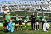 16 April 2015; The FAI today launched the SportsWorld FAI Summer Soccer Schools and also announced Temple Street Childrens Hospital as their charity partner for this year. In attendance at the launch is Republic of Ireland manager Martin O'Neill with, from left, Rua, mascot, Jevon Somers Whitty, Aoife Doran, Brian Gallagher, Anna Secka, Sinead Gallagher, Mark Bates and Alex Giles. Launch of the 2015 SportsWorld FAI Summer Soccer Schools, Aviva Stadium, Lansdowne Road, Dublin. Picture credit: Pat Murphy / SPORTSFILE