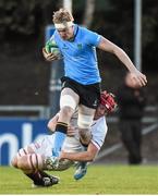 16 April 2015; Donagh Lawler, UCD, is tackled by Jack Burke, Trinity. Annual Rugby Colours, UCD v Trinity. UCD Bowl, Belfield, Dublin. Picture credit: Pat Murphy / SPORTSFILE