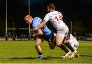 16 April 2015; UCD's Conall Doherty goes over for what proved to be the winning try despite the attention of Trinity's Tim Maupin, 14, and Raef Tyrell. Annual Rugby Colours, UCD v Trinity. UCD Bowl, Belfield, Dublin. Picture credit: Pat Murphy / SPORTSFILE