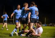 16 April 2015; UCD players, from left, Harry McNulty, Donagh Lawler and Barry Daly celebrate after team-mate Conall Doherty, second from right, scored the winning try. Annual Rugby Colours, UCD v Trinity. UCD Bowl, Belfield, Dublin. Picture credit: Pat Murphy / SPORTSFILE