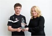 17 April 2015; Kildare U21 footballer Niall Kelly is presented with the EirGrid Player of the Month for March for his outstanding performances during the month in the EirGrid GAA U21 Football Leinster Championship. Niall is presented with his award by Rosemary Steen, Director of Public Affairs at EirGrid. Herbert Park Hotel, Dublin. Picture credit: Piaras O Midheach / SPORTSFILE