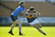 18 April 2015; Colin O'Riordan, Tipperary, is tackled by Stephen Cunningham, Dublin. EirGrid GAA All-Ireland U21 Football Championship Semi-Final, Dublin v Tipperary. O'Connor Park, Tullamore, Co. Offaly. Picture credit: Ramsey Cardy / SPORTSFILE