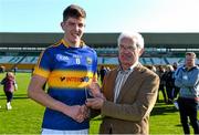 18 April 2015; Tipperary's Steven O'Brien is presented with the EirGrid Man of the Match award by John O'Connor, Chairman, EirGrid. EirGrid GAA All-Ireland U21 Football Championship Semi-Final, Dublin v Tipperary. O'Connor Park, Tullamore, Co. Offaly. Picture credit: Ramsey Cardy / SPORTSFILE