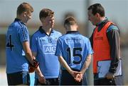 18 April 2015; Dublin manager Paddy Christie speaks to his players, from left, Callum Pearson, Sean Caffrey and Dillon Keating at half-time. Electric Ireland Leinster GAA Football Minor Championship, Dublin v Offaly, Parnell Park, Dublin. Picture credit: Piaras Ã“ Mídheach / SPORTSFILE