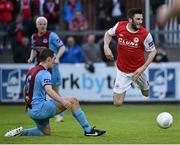 20 April 2015; Killian Brennan, St Patrick's Athletic, in action against Mick Daly, Drogheda United. SSE Airtricity League Premier Division, St Patrick's Athletic v Drogheda United. Richmond Park, Dublin. Picture credit: David Maher / SPORTSFILE