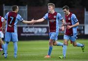 20 April 2015; Drogheda United's  Lloyd Buckley, centre, celebrates with team-mate Cathal Brady, left, after scoring his side's first goal. SSE Airtricity League Premier Division, St Patrick's Athletic v Drogheda United. Richmond Park, Dublin. Picture credit: David Maher / SPORTSFILE