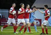 20 April 2015; St Patrick's Athletic's Conan Byrne, second from right, celebrates with team-mates, from left, Ciaran Kilduff, Chris Forrester and Lee Desmond after scoring his side's first goal. SSE Airtricity League Premier Division, St Patrick's Athletic v Drogheda United. Richmond Park, Dublin. Picture credit: David Maher / SPORTSFILE
