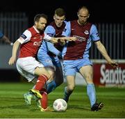 20 April 2015; Conan Byrne, St Patrick's Athletic, in action against Joe Gorman and Alan Byrne, Drogheda United. SSE Airtricity League Premier Division, St Patrick's Athletic v Drogheda United. Richmond Park, Dublin. Picture credit: David Maher / SPORTSFILE