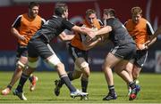 21 April 2015; Munster's Tommy O'Donnell is tackled by Dave O'Callaghan, left, and Niall Scannell during squad training. Irish Independent Park, Cork. Picture credit: Diarmuid Greene / SPORTSFILE