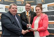 22 April 2015; Ciara Rossiter, Wexford Youths Women's AFC, winner of the Continental Tyres Young Player of the Year award, receives her award from Eamon Naughton, left, FAI Chairman of the National League, and Peter Robb, Marketing Communications Manager, Continental Tyre Group, at the Continental Tyres Womenâ€™s National League Annual Awards 2015. Clyde Court Hotel, Ballsbridge, Dublin. Picture credit: David Maher / SPORTSFILE