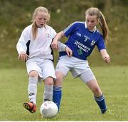 23 April 2015; Kerry Brown, Greencastle NS, Inishowen, Co. Donegal, in action against Kayla Brady, St. Mary's NS, Arva, Co. Cavan. SPAR FAI Primary School 5s Ulster Final, St. Mary's NS, Arva, Co. Cavan v Greencastle NS, Inishowen, Co. Donegal. Sherlock Park, Cootehill Harps FC, Cootehill, Co. Cavan. Picture credit: Matt Browne / SPORTSFILE