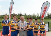 23 April 2015; Gerald Sloane, from SPAR Monaghan Town, presents Butlersbridge, NS, Co. Cavan, team captains Kevin McPhillips, left, and Cathal Leddy with the cup. SPAR FAI Primary School 5s Ulster Final. Sherlock Park, Cootehill Harps FC, Cootehill, Co. Cavan. Picture credit: Matt Browne / SPORTSFILE