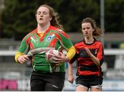 24 April 2015; Mary Healy, St Kevin's Dunlavin, on her way to scoring a try despite the efforts of Linda D'arcy, Piper's Hill College, Naas, Co. Kildare. Bank of Ireland Leinster School Girls 7s Senior Blitz. Donnybrook Stadium, Donnybrook, Co. Dublin. Picture credit: Piaras Ó Mídheach / SPORTSFILE