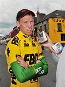 19 May 2008; Stephen Gallagher, An Post sponsored Sean Kelly team, speaks to members of the media after collecting the race leaders yellow jersey. FBD Insurance Ras 2008 - Stage 2, Ballinamore - Claremorris. Picture credit: Stephen McCarthy / SPORTSFILE