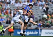 18 May 2008; Tony Hannon, Wicklow, kicks a point despite the attentions of Andrew McLoughlin, Kildare. GAA Football Leinster Senior Championship 1st Round, Kildare v Wicklow, Croke Park, Dublin. Picture credit: Brendan Moran / SPORTSFILE