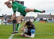 25 April 2015; Tommy Seymour, Glasgow Warriors, scores his side's fifth try dispite the tackle of John Cooney, Connacht. Guinness PRO12, Round 20, Connacht v Glasgow Warriors. Sportsground, Galway. Picture credit: Oliver McVeigh / SPORTSFILE