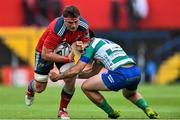 25 April 2015; CJ Stander, Munster, is tackled by Sam Christie, Benetton Treviso. Guinness PRO12, Round 20, Munster v Benetton Treviso. Irish Independent Park, Cork. Picture credit: Ramsey Cardy / SPORTSFILE